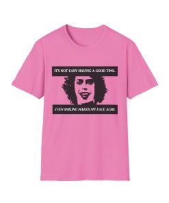 'It's not easy having a good time...even smiling makes my face ache' on a shirt in the color Azalea. - Memento Mary