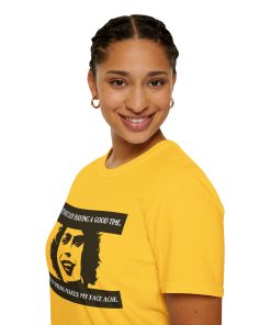 'It's not easy having a good time...even smiling makes my face ache' on a shirt in the color Daisy. - Memento Mary