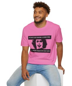 'It's not easy having a good time...even smiling makes my face ache' on a shirt in the color Azalea. - Memento Mary