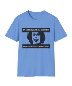 'It's not easy having a good time...even smiling makes my face ache' on a shirt in the color Carolina Blue. Memento Mary