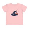 Witches hat and broom on a shirt in the color Pink - Memento Mary